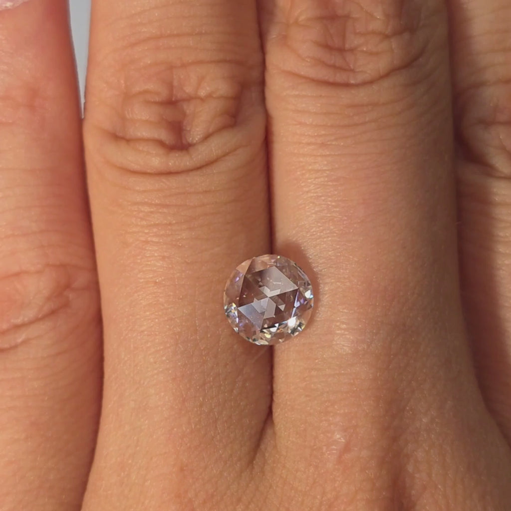 Lab diamond 1.76ct round rose cut D color VVS2 by DovEggs hand modeled in warm indoor light.