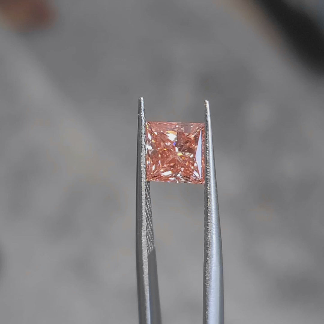 2.41ct princess cut pink diamond video showing square facets in sunlight