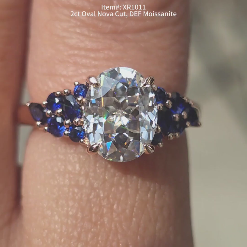 DovEggs Oval Nova cut moissanite ring sparkling in sunlight video.