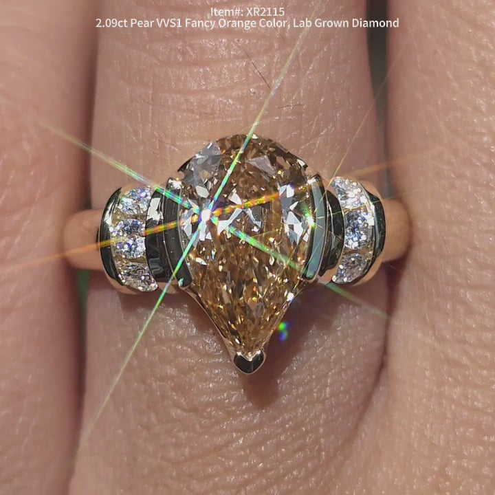 DovEggs pear lab diamond engagement ring sparkling in sunlight video