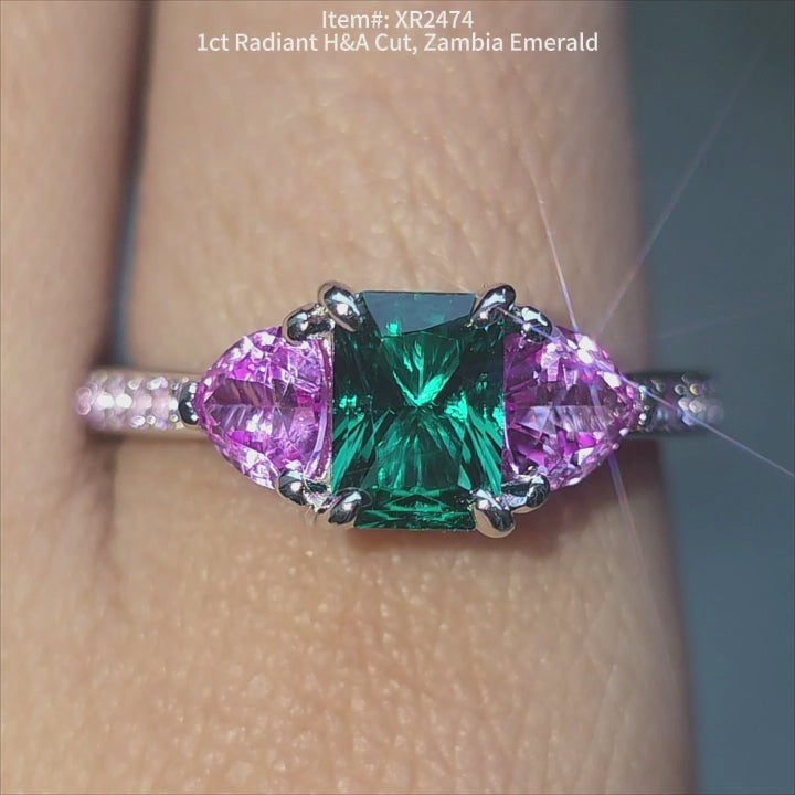DovEggs 1ct Radiant Hearts & Arrows cut Zambia emerald ring sparkling in sunlight video.