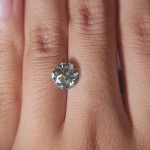 "Finger modeling video of 1.53ct old euro cut round lab grown diamond in museum lighting"
