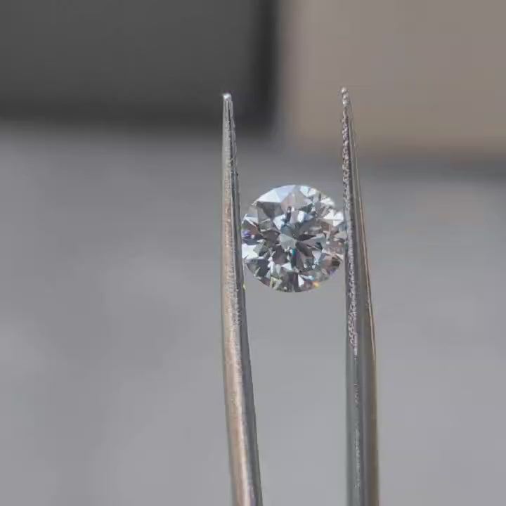 2.03ct round ideal cut lab diamond (F/VVS2) in sunlight, showcasing maximum brilliance and fire