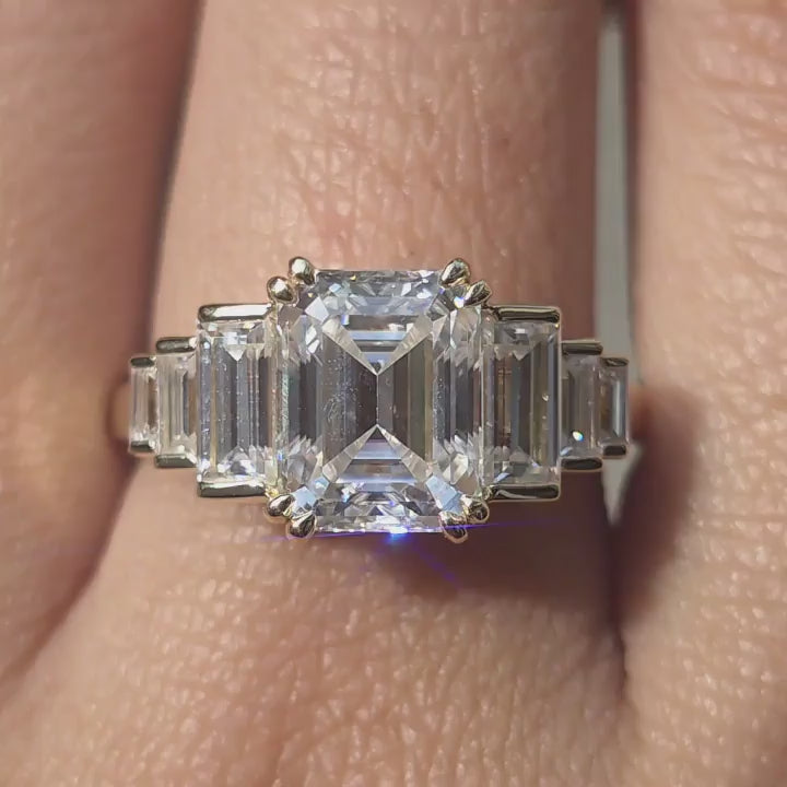 DovEggs emerald cut moissanite ring sparkling in sunlight video