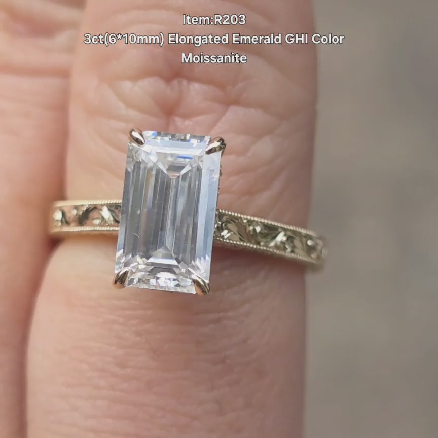 DovEggs Elongated emerald moissanite ring sparkling in sunlight video
