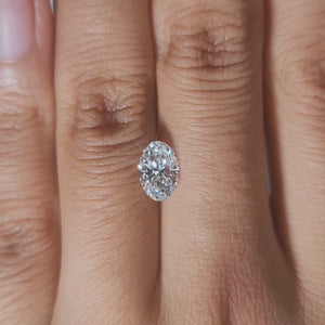 Hand-worn video of 1.01ct oval lab diamond under cozy indoor lighting