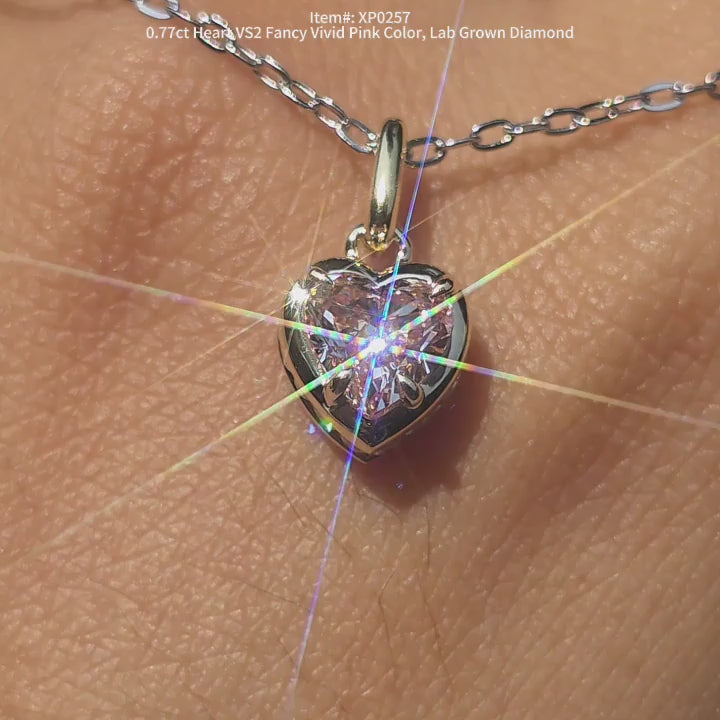 DovEggs heart lab diamond pendant sparkling in sunlight