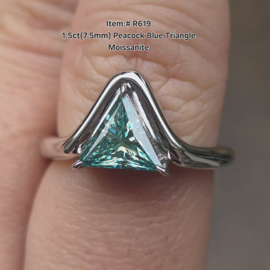 DovEggs triangle pecock blue moissanite ring sparkling in natural light video