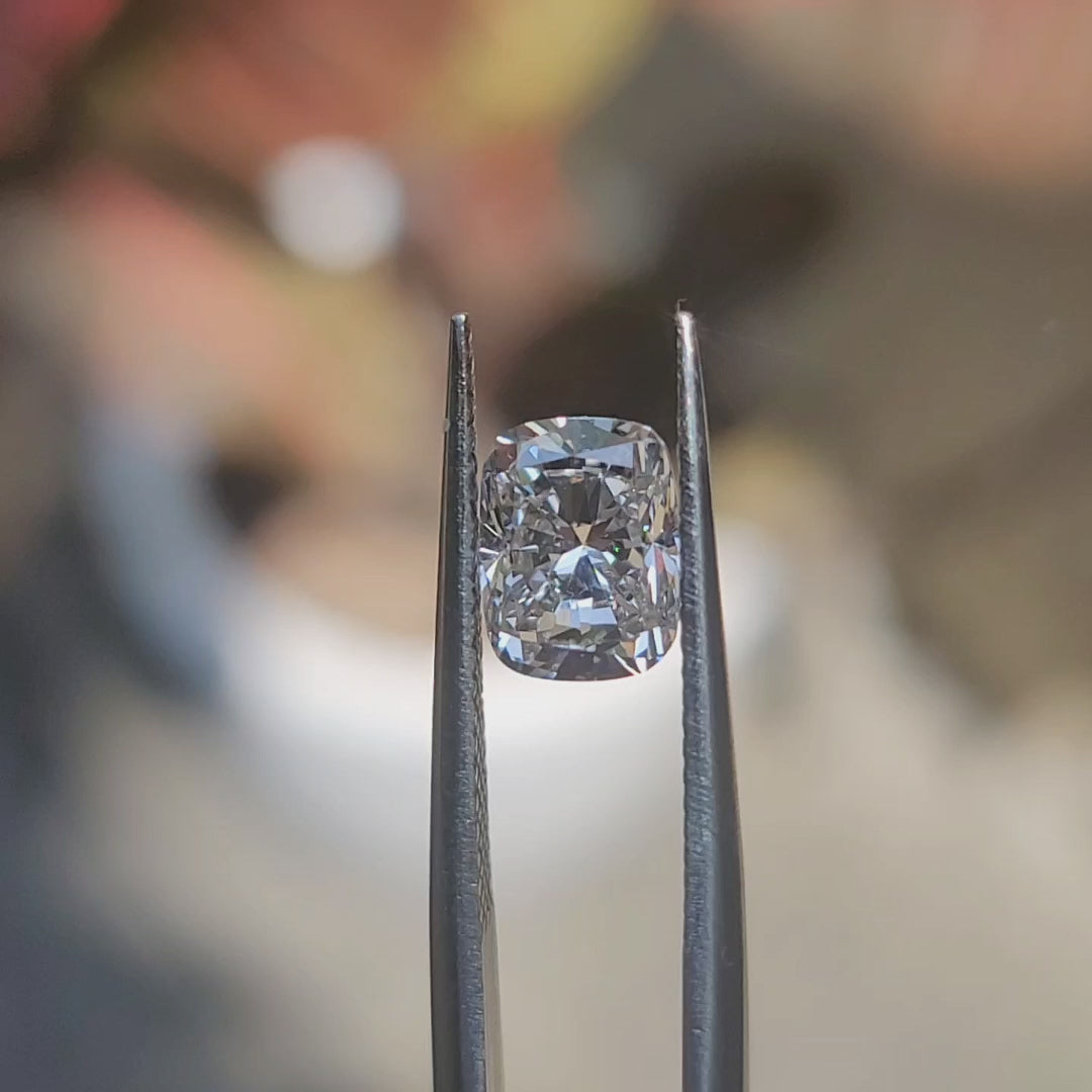 "Sunlight video showing 2.105ct cushion cut diamond's F color sparkle"