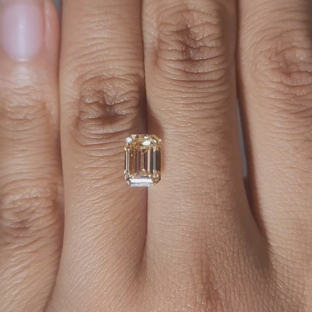 Finger video showing emerald lab diamond proportions