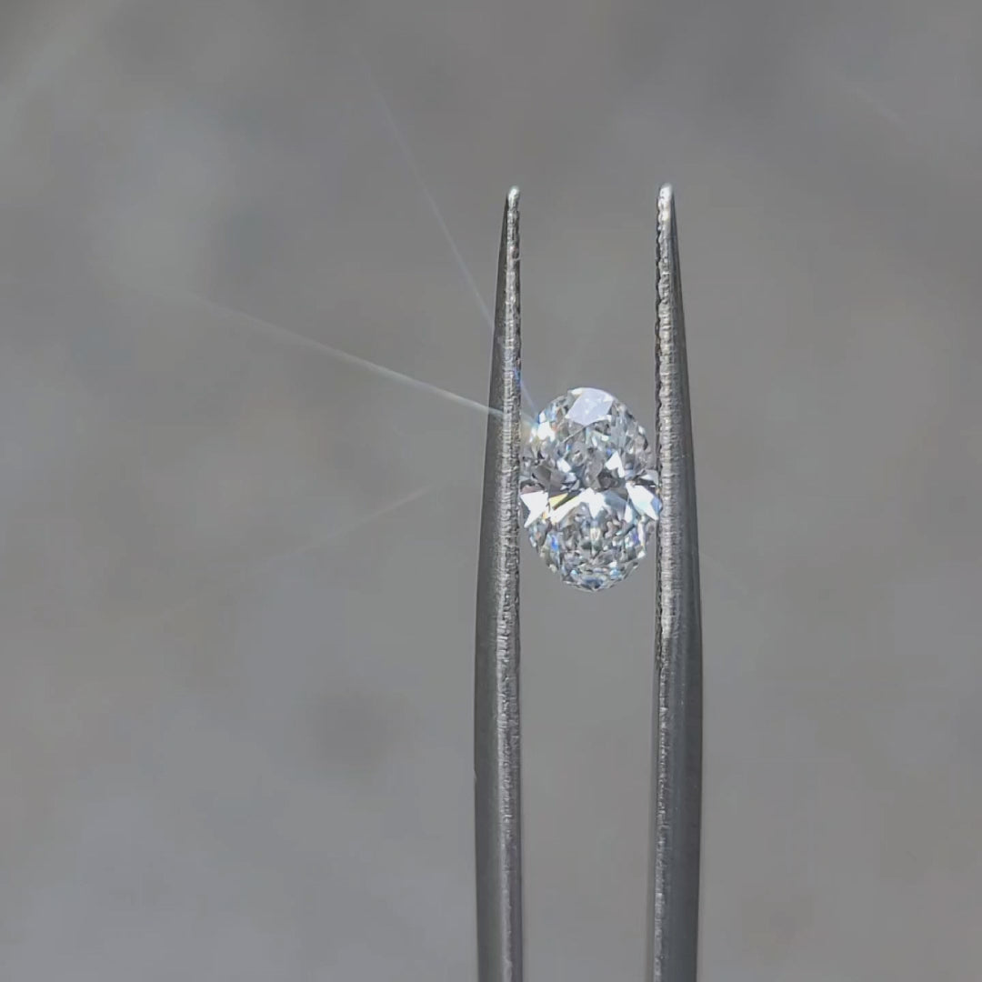Outdoor sunlight video of 1.01ct oval D color lab diamond's sparkle