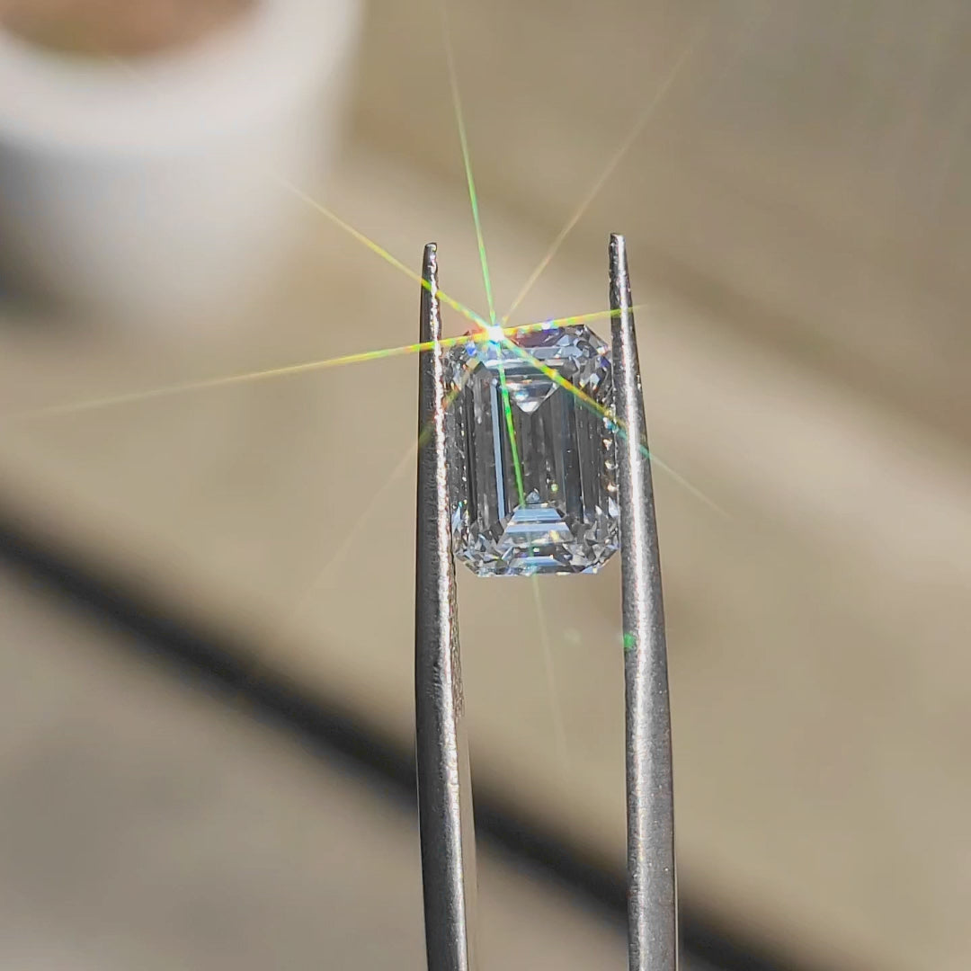 360-degree video showing 3.20ct emerald cut lab diamond's D color and sparkle