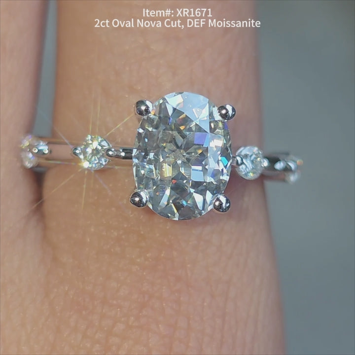 DovEggs 2ct Oval Nova cut DEF color moissanite ring sparkling in sunlight video.