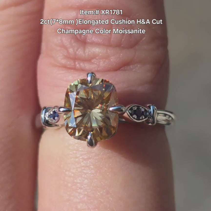 DovEggs Elongated Cushion Champagne moissanite ring sparkling in sunlight video.