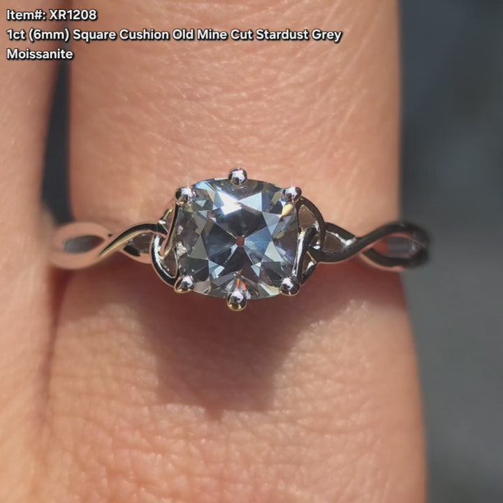 DovEggs square cushion old mine cut stardust grey color moissanite ring sparkling on-hand video.