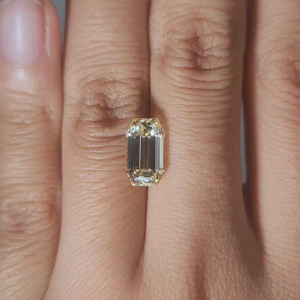 2.85ct Emerald yellow diamond in soft candlelight