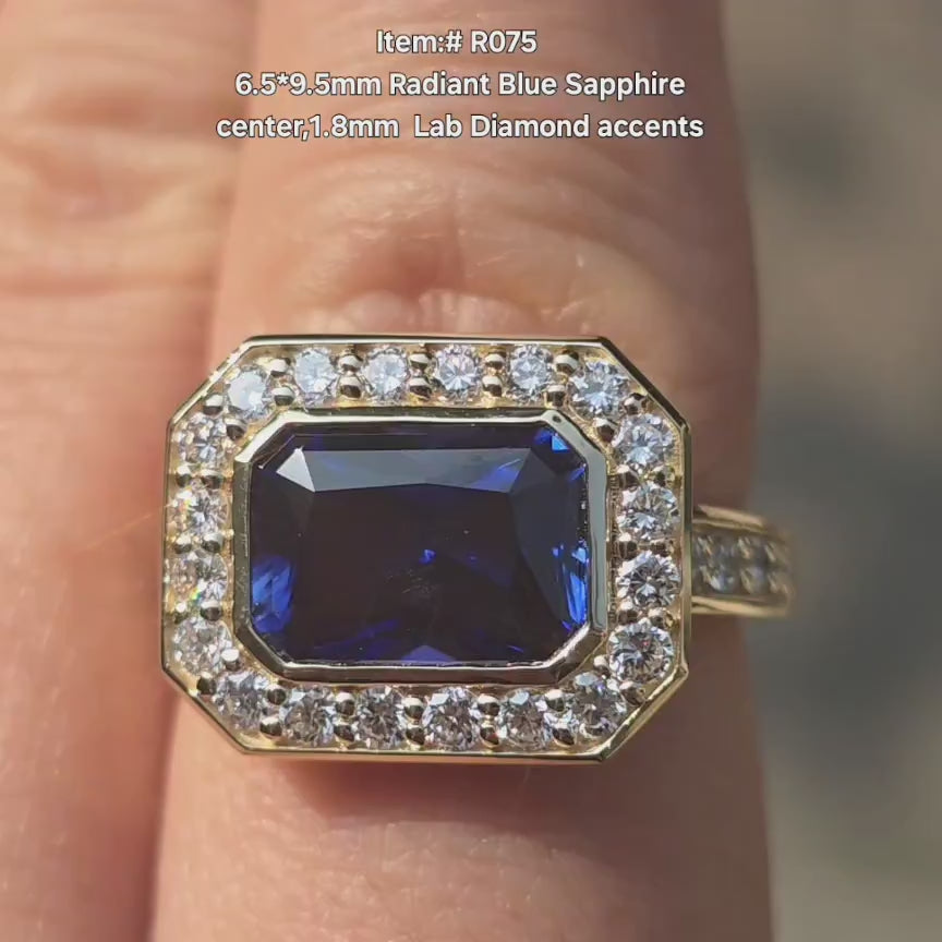 DovEggs radiant blue sapphire with halo lab diamonds engagement ring in sunlight
