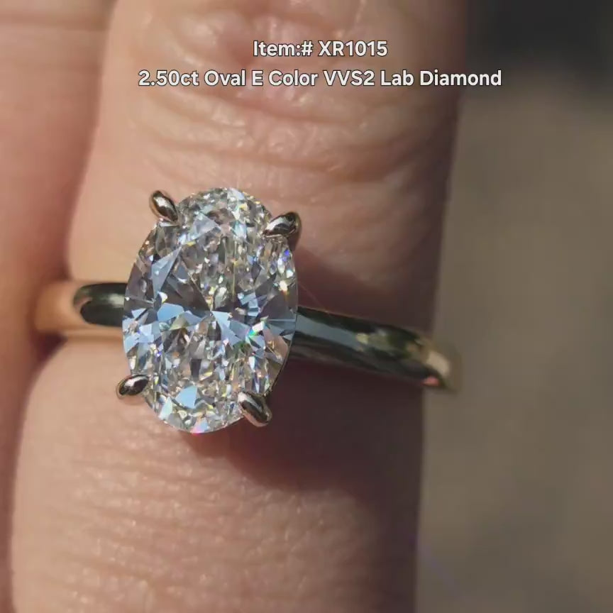 DovEggs 2.5ct oval lab diamond solitaire engagement ring in sunlight