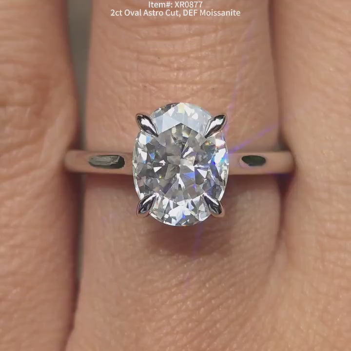 DovEggs oval solitaire moissanite engagement ring video in sunlight