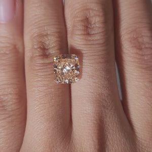 hand comparison video of 3.65ct orange radiant diamond