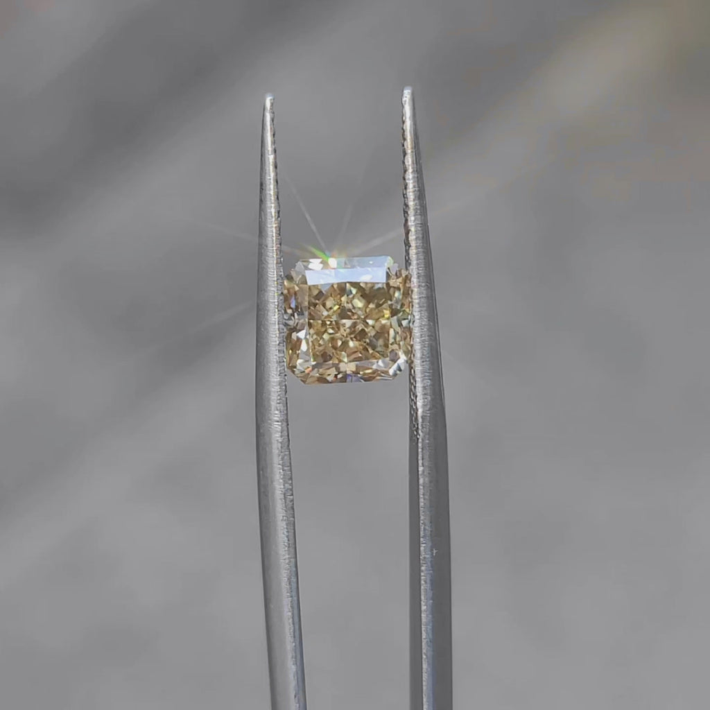 Sunlight video capturing 2.312ct radiant vivid yellow diamond's brilliance