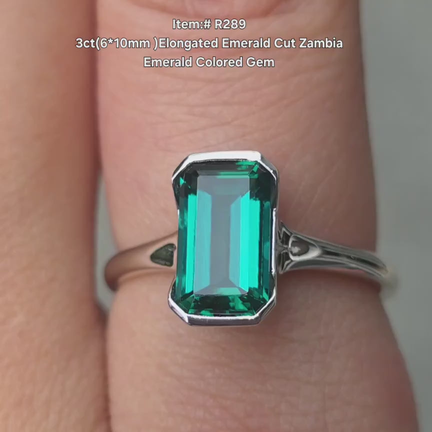 DovEggs elongated solitaire zambia emerald engagement ring video