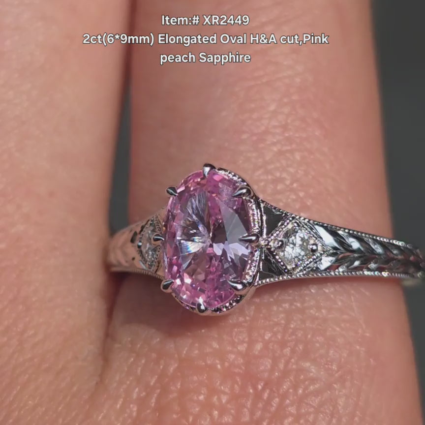 DovEggs Elongated Oval H&A pink sapphire ring sparkling in sunlight video