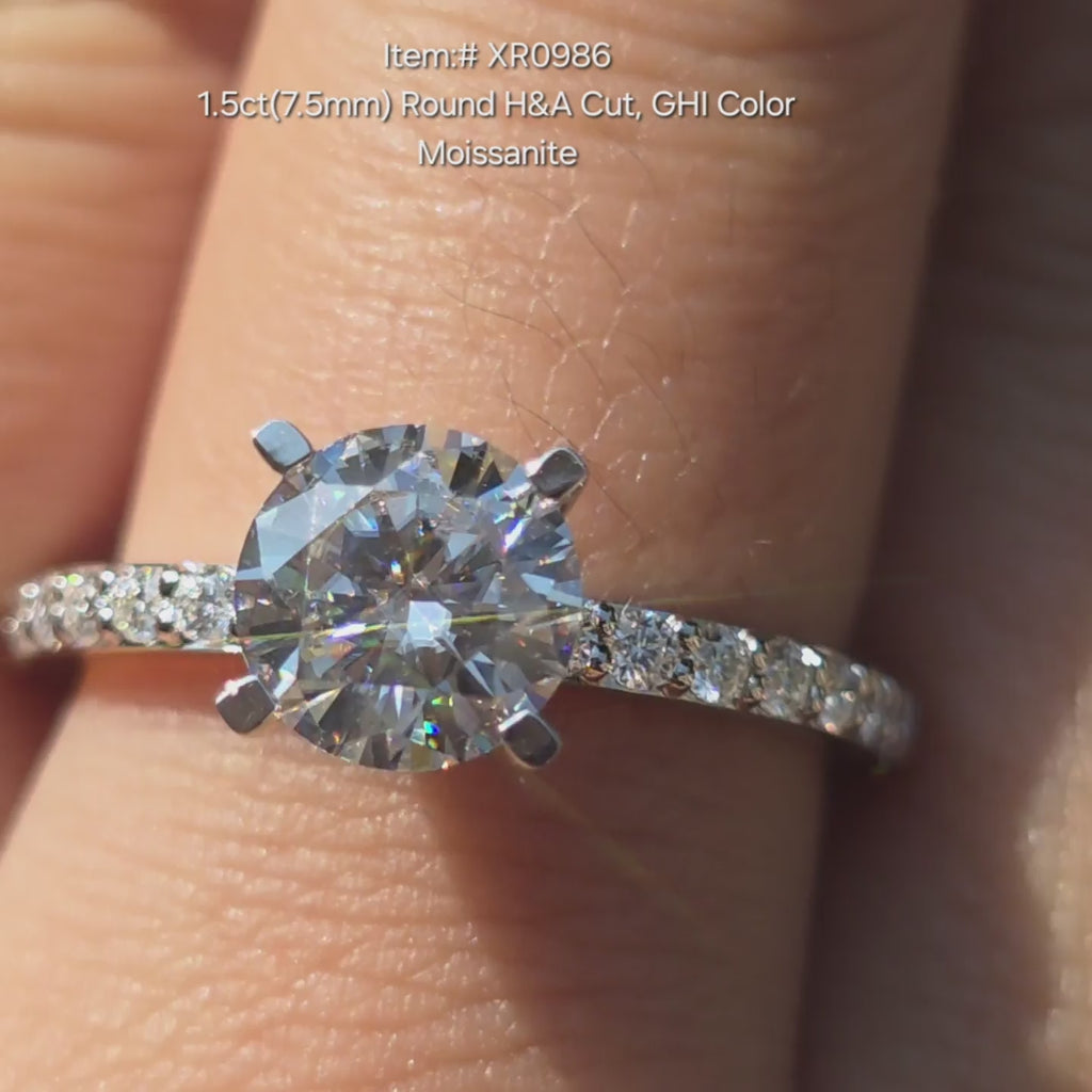 DovEggs round moissanite ring sparkling in sunlight video.
