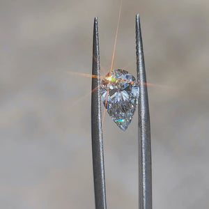 Outdoor video capturing 1.79ct pear F color VS1 diamond's delicate sparkle