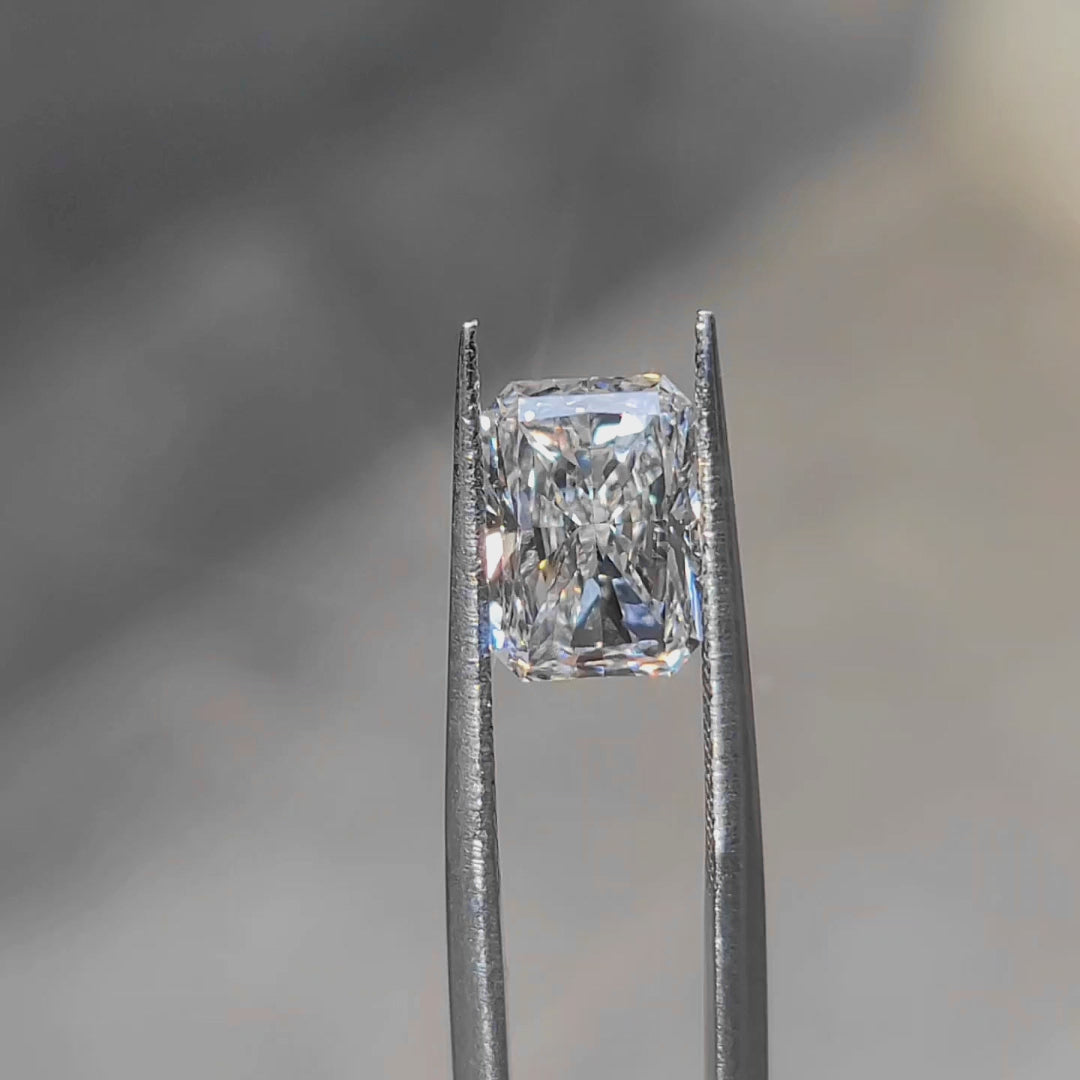 3.03ct radiant lab diamond (F/VVS1) in natural light, displaying crushed ice brilliance