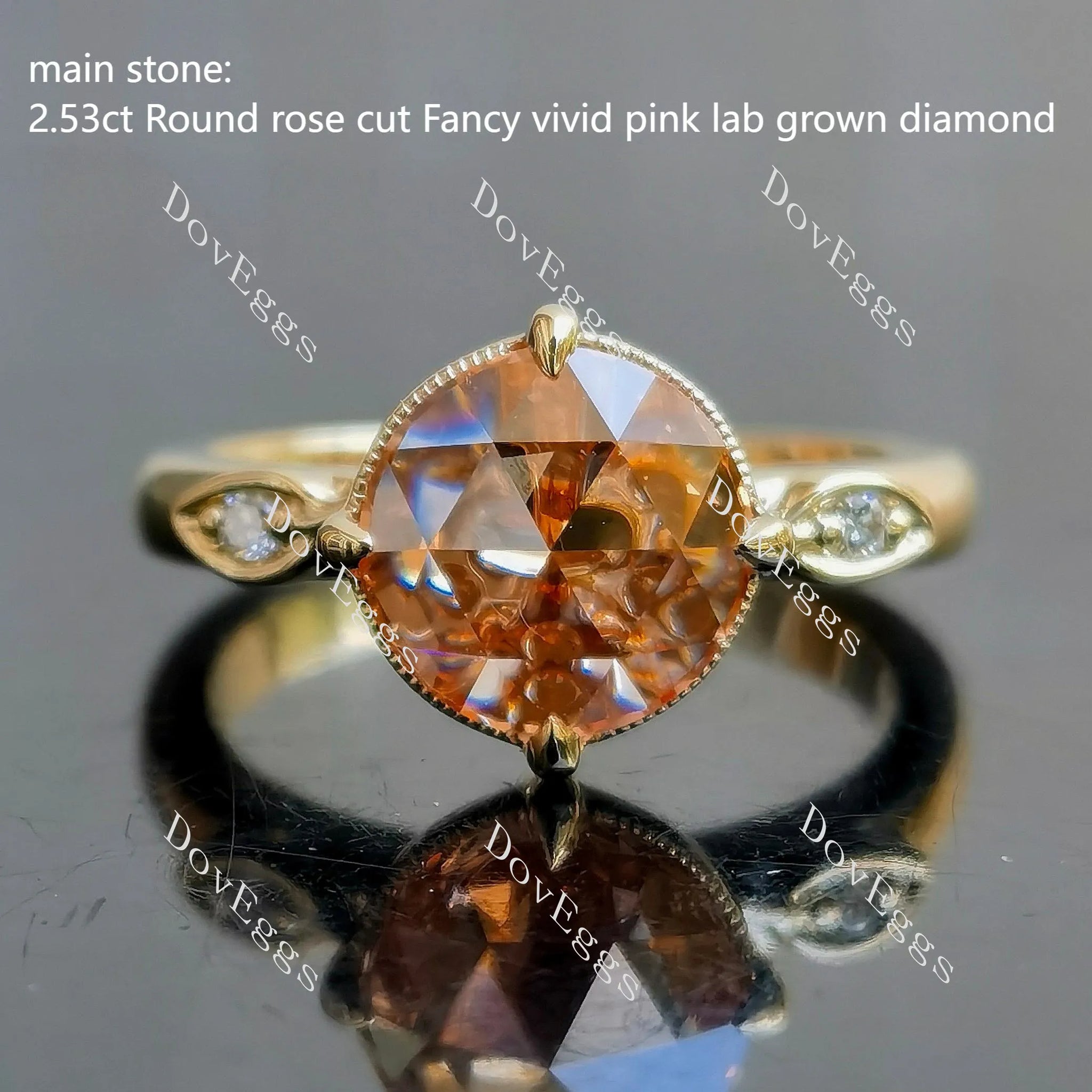 rose cut lab grown dimaond with clawing prongs setting.