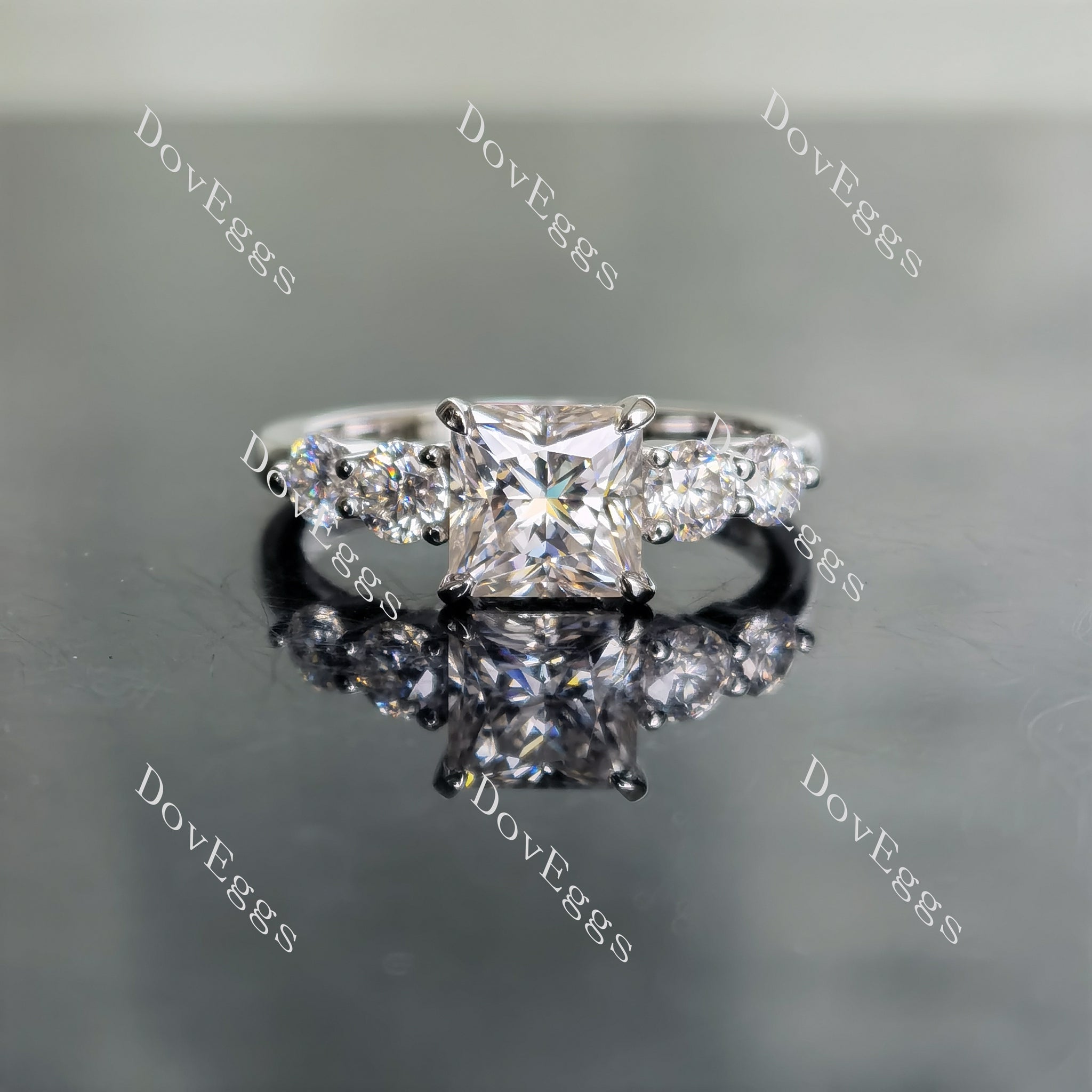 DovEggs princess side stones moissanite engagement ring