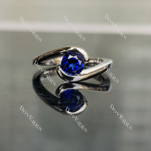 Ocean Wave round solitaire intense royal blue sapphire colored gem engagement ring