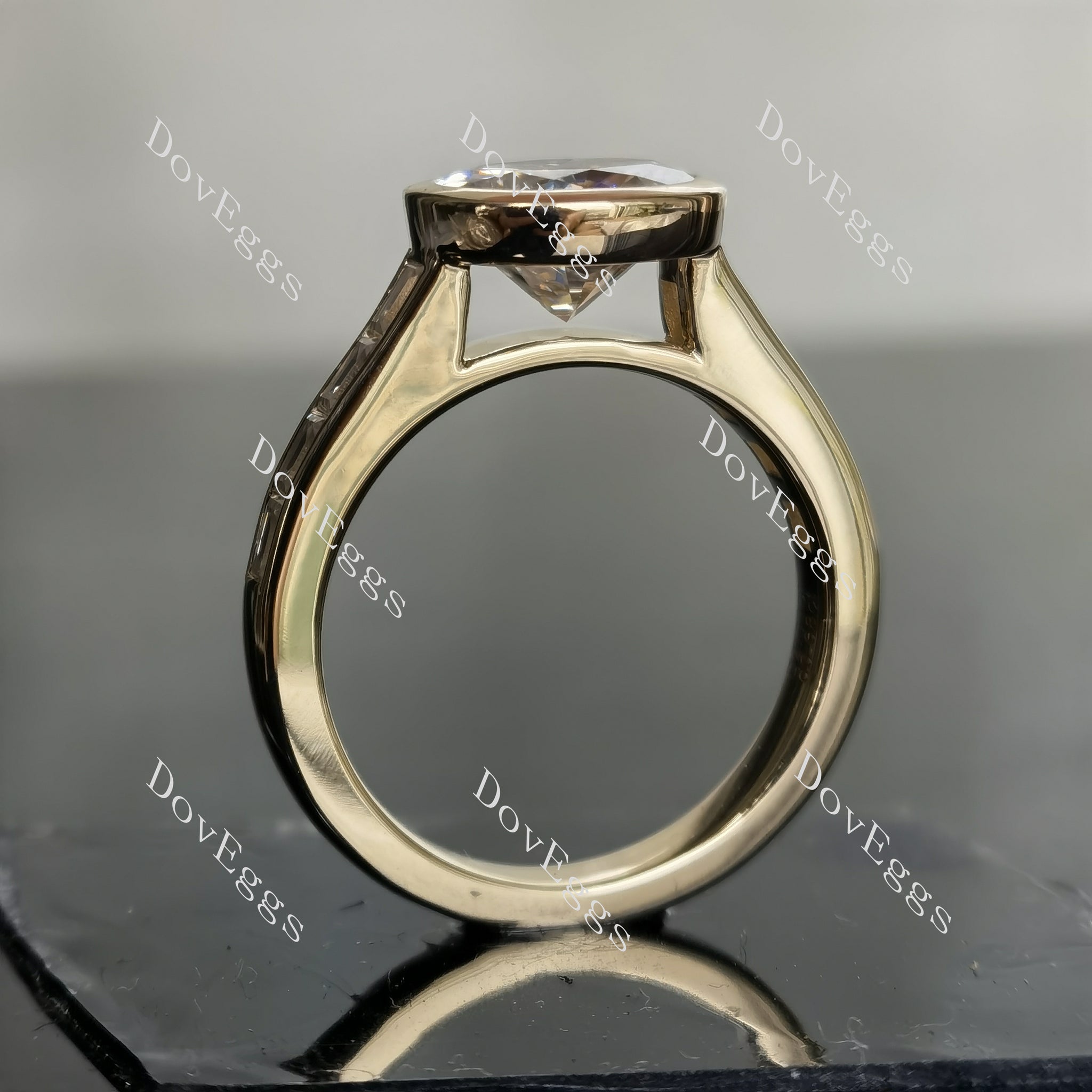 DovEggs oval bezel channel set moissanite engagement ring