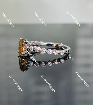 Doveggs elongated oval champagne moissanite ring
