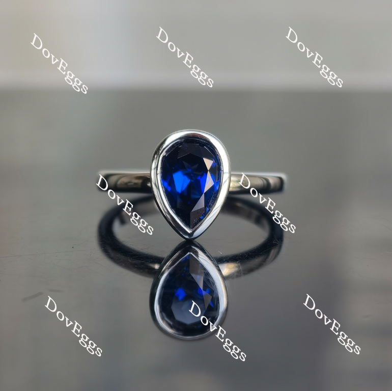 Wendyann's bezel setting pear solitaire intense royal blue sapphire ring