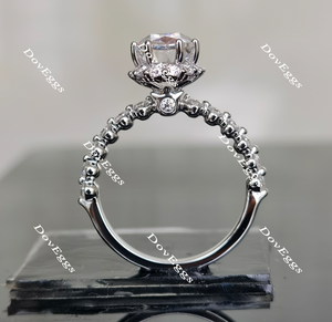 elongated oval moissanite engagement ring