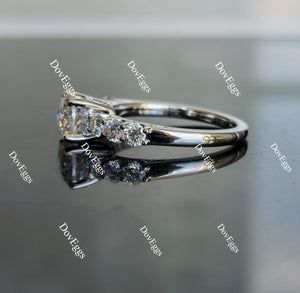 Mon Cherie round side stone moissanite engagement ring