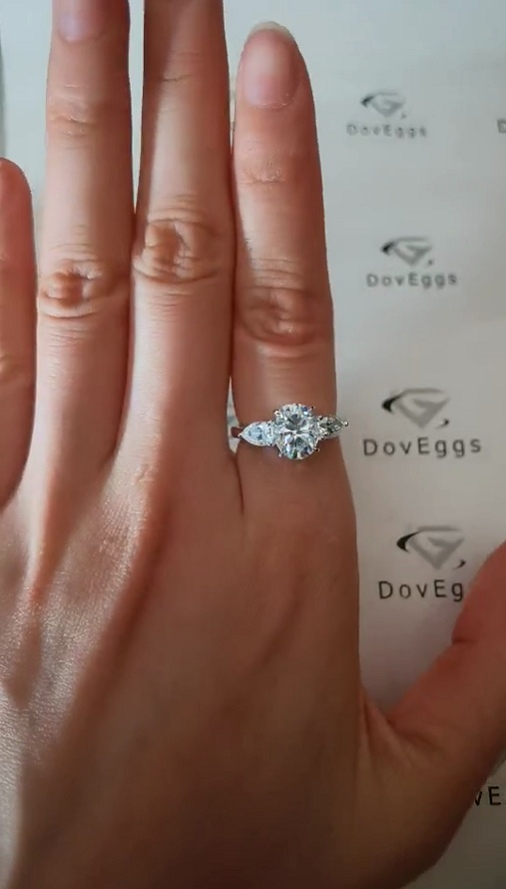 DovEggs oval three-stone moissanite engagement ring