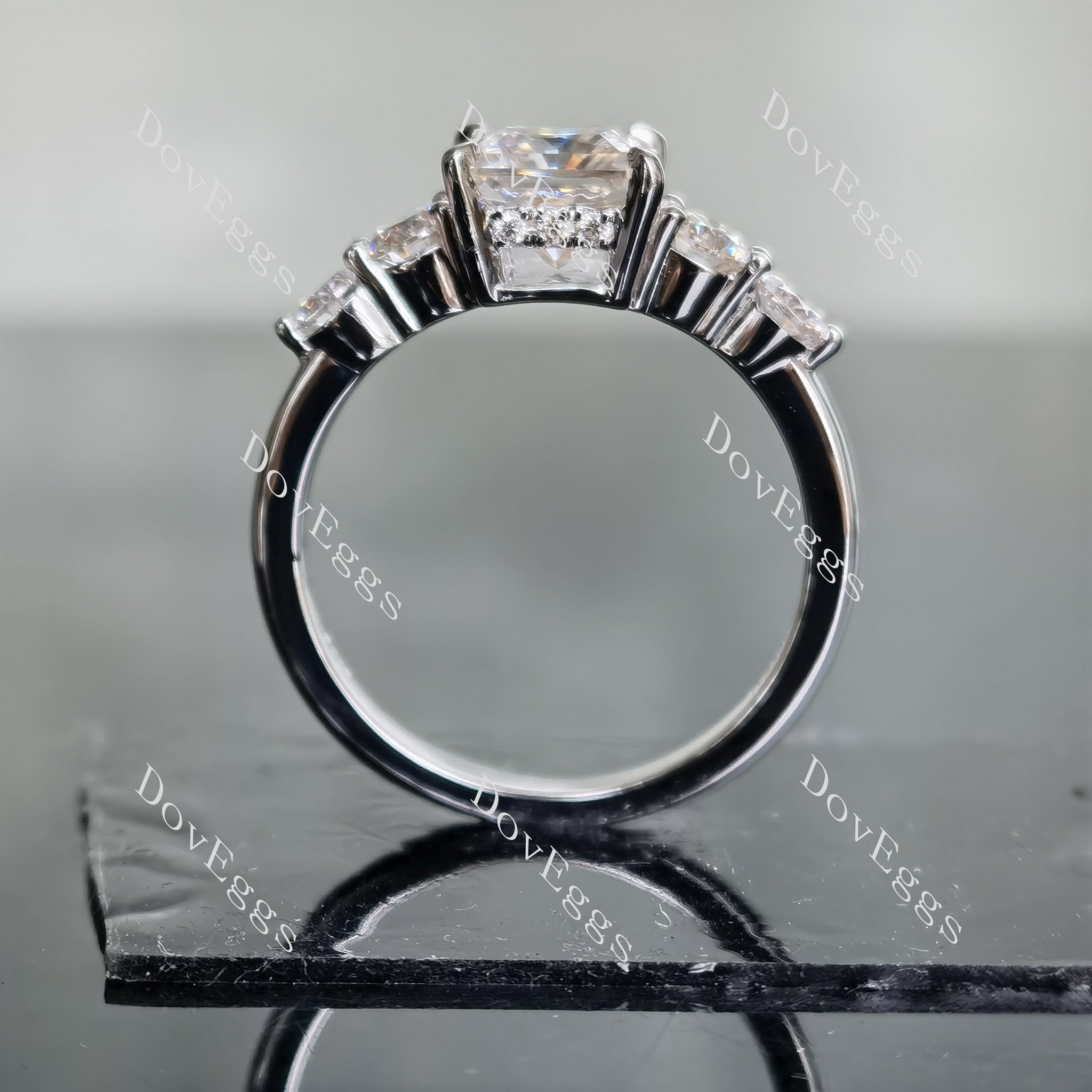 DovEggs princess side stones moissanite engagement ring