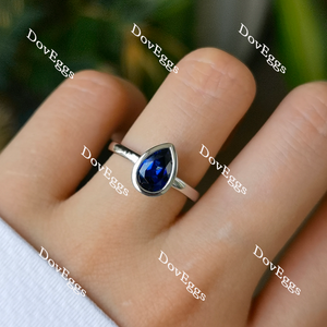Wendyann's bezel setting pear solitaire intense royal blue sapphire ring