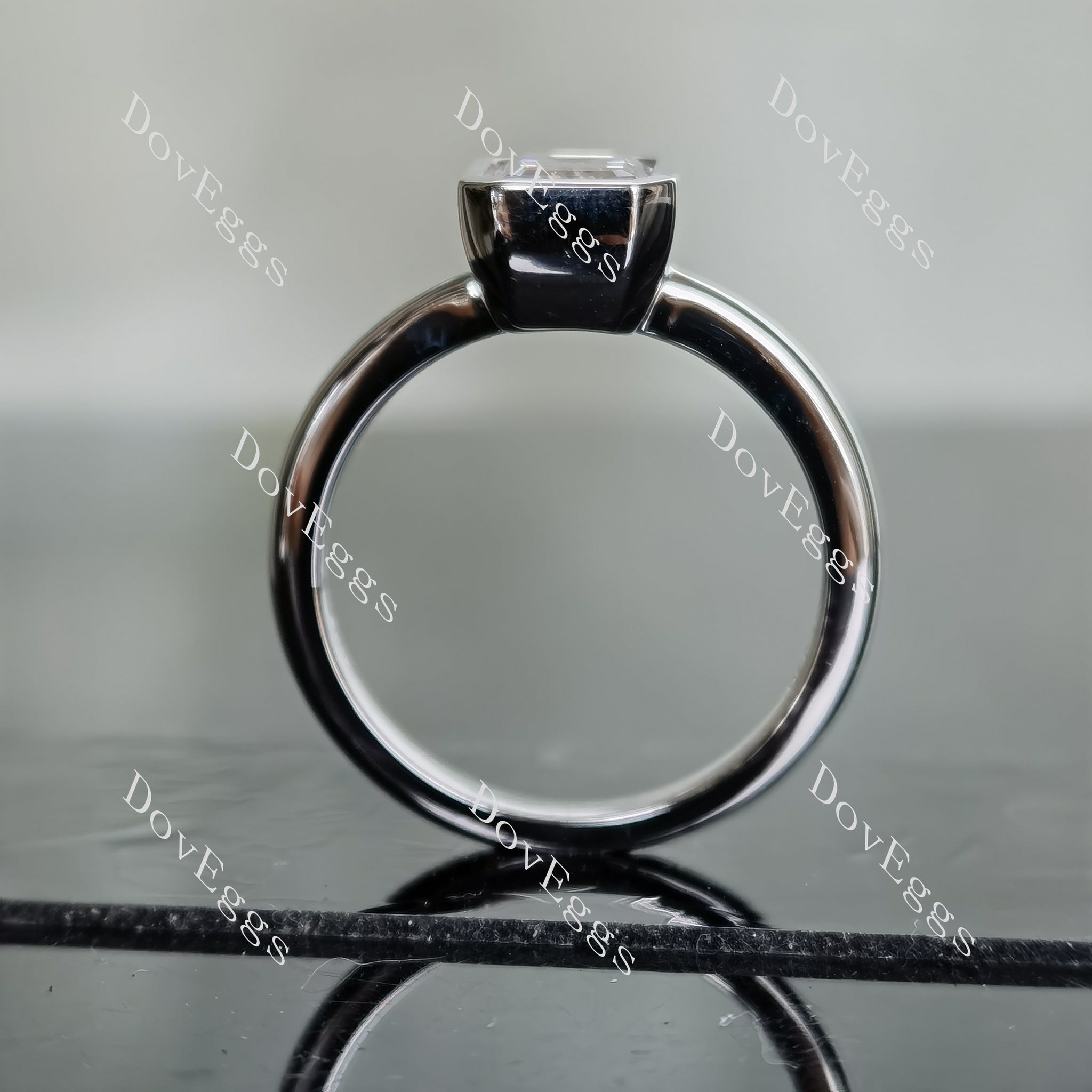DovEggs emerald bezel solitaire moissanite bridal set (3 rings)