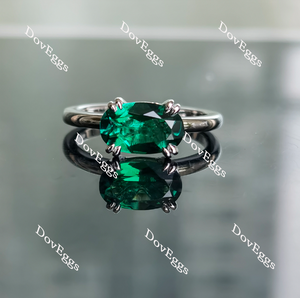 Doveggs elongated oval solitaire zambia emerald coclored gem engagement ring