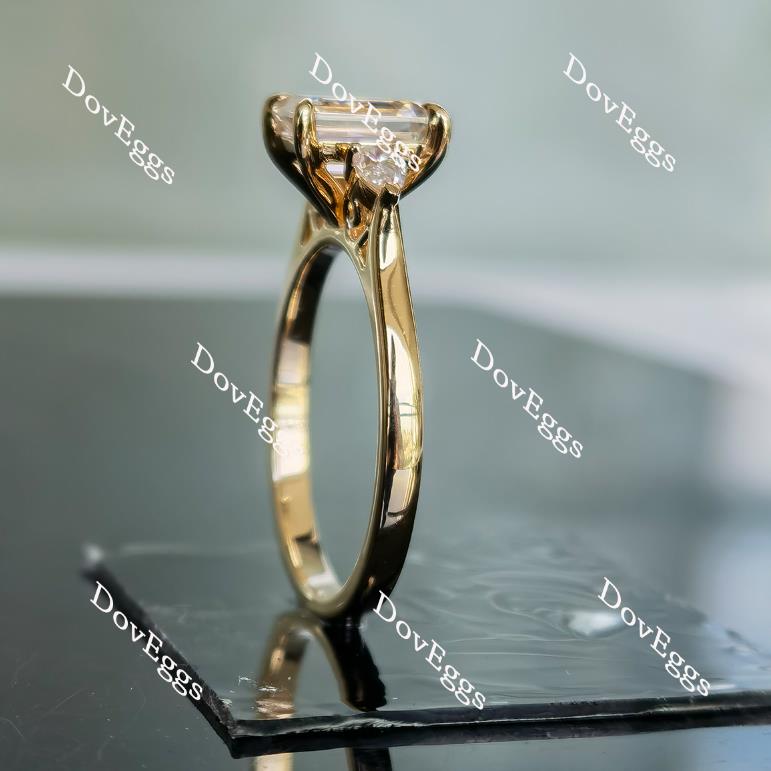 The Ara emerald vintage three stone moissanite ring