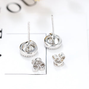 Doveggs bezel setting round moissanite stud earrings for women