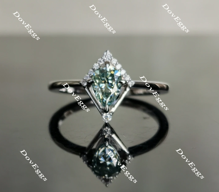 Peacock blue moissanite engagement ring