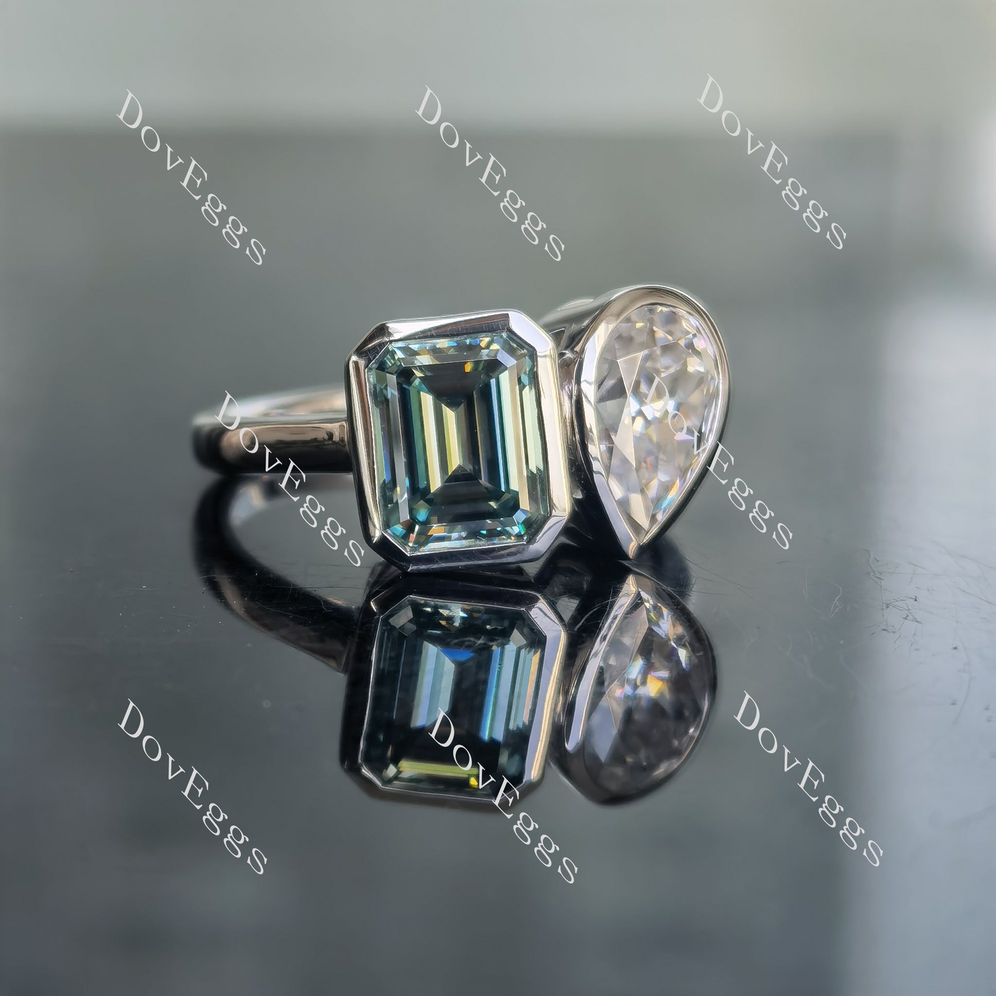 Doveggs emerald pear two stones bezel setting moissanite engagement ring