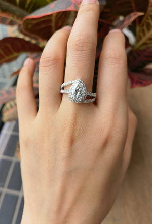 Doveggs pear curved halo moissanite engagement ring