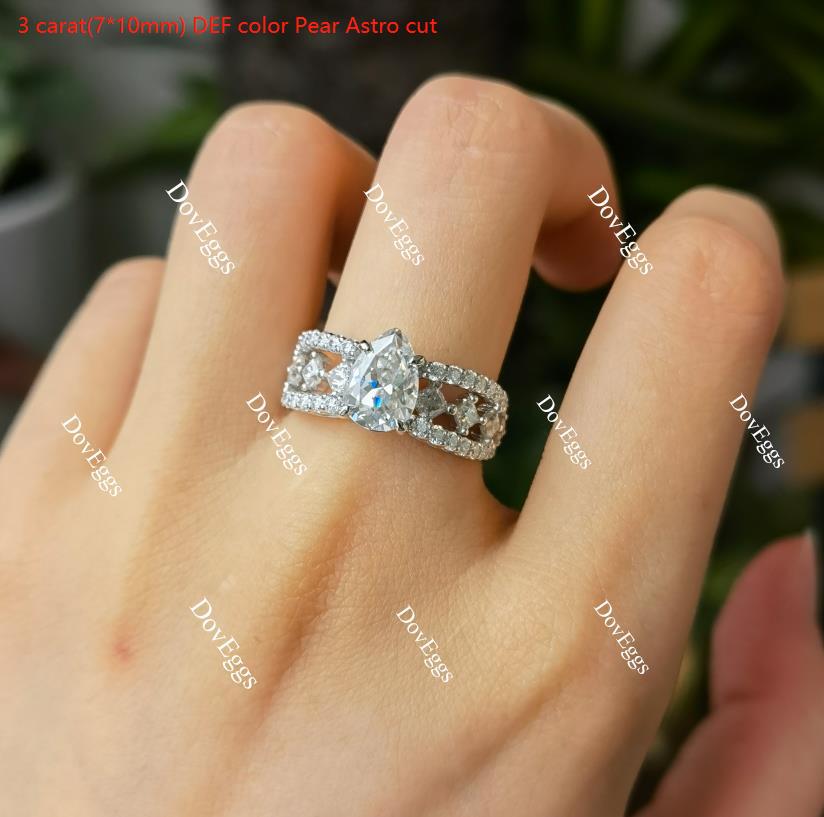 The Mikinzy pear split shank half eternity pave moissanite engagement ring