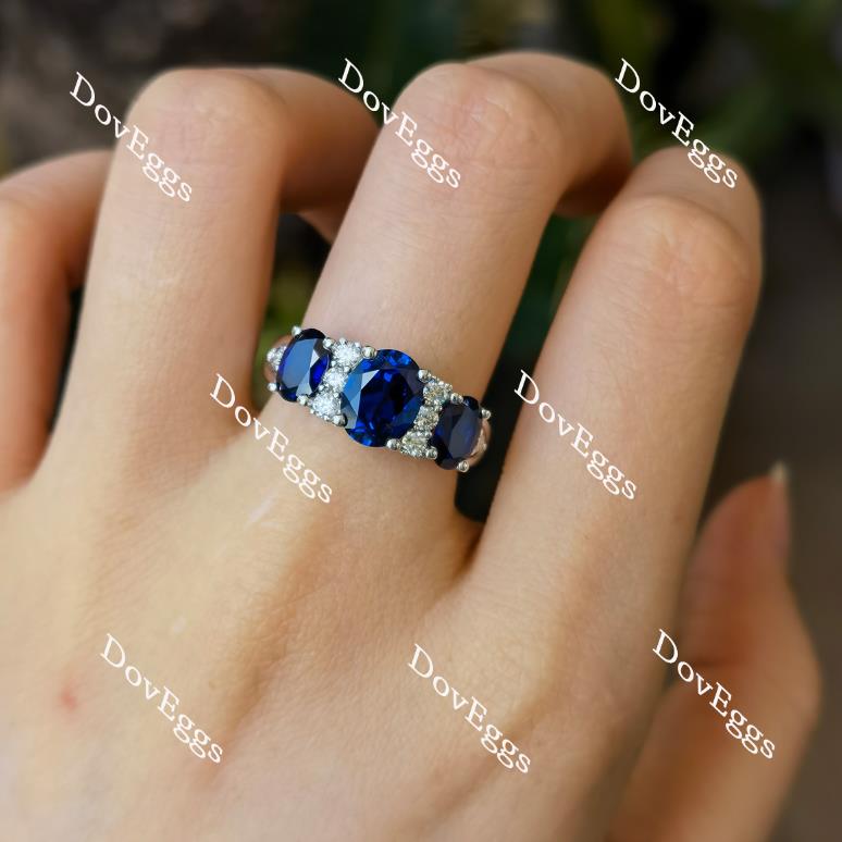 Doveggs oval three-stone intense royal blue sapphire center stone wedding band
